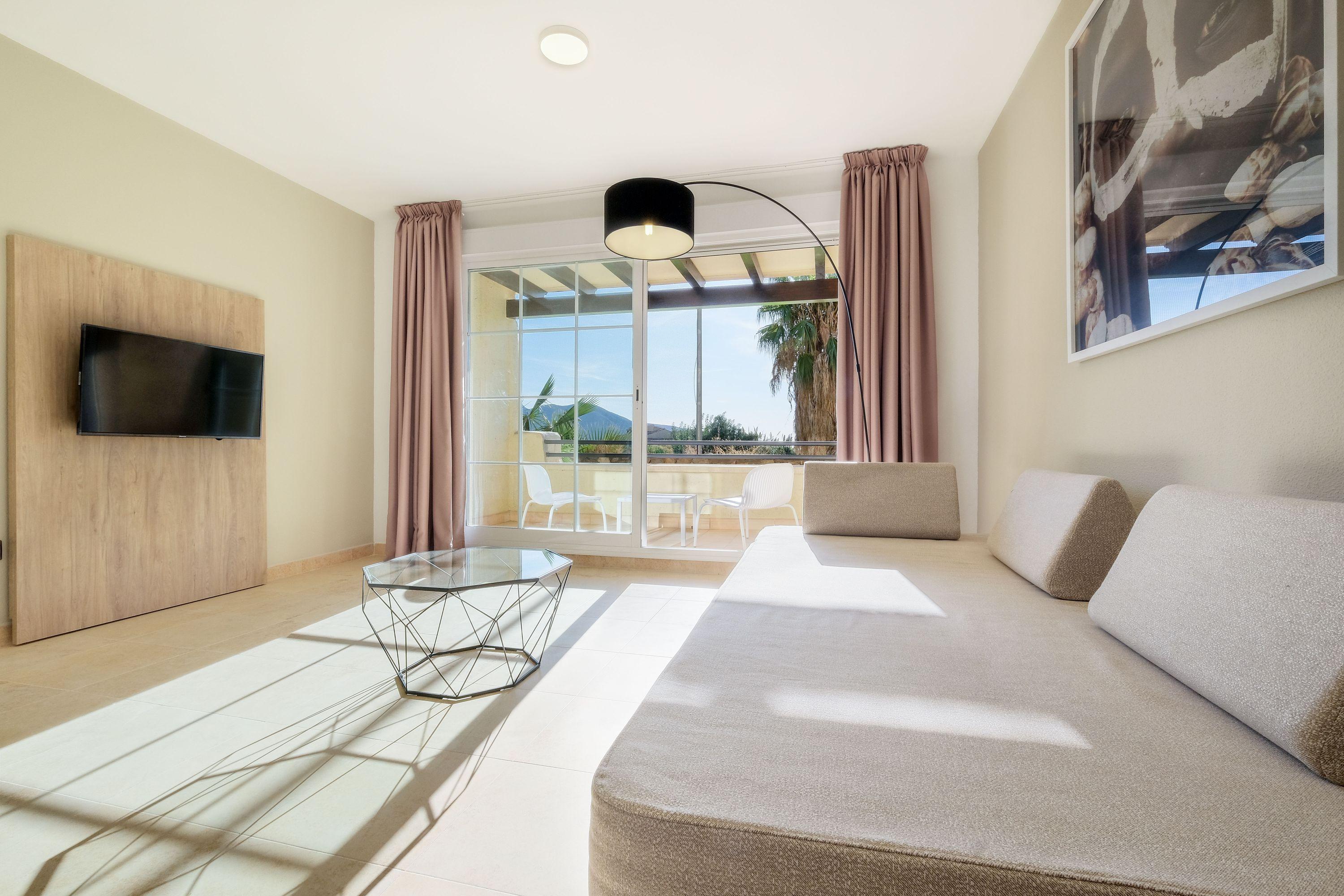 Hotel Envia Almeria Spa & Golf アグアドゥルセ エクステリア 写真 A living room in a hotel